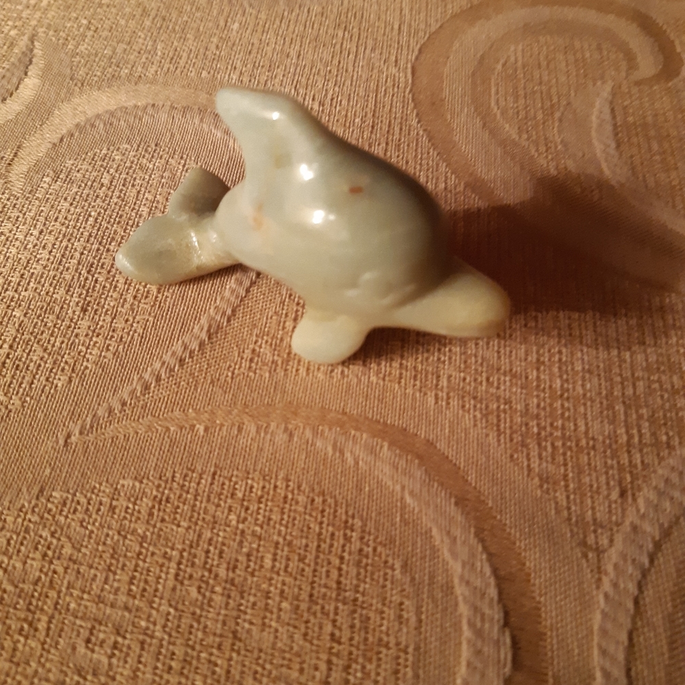 Hand carved stone dolphin